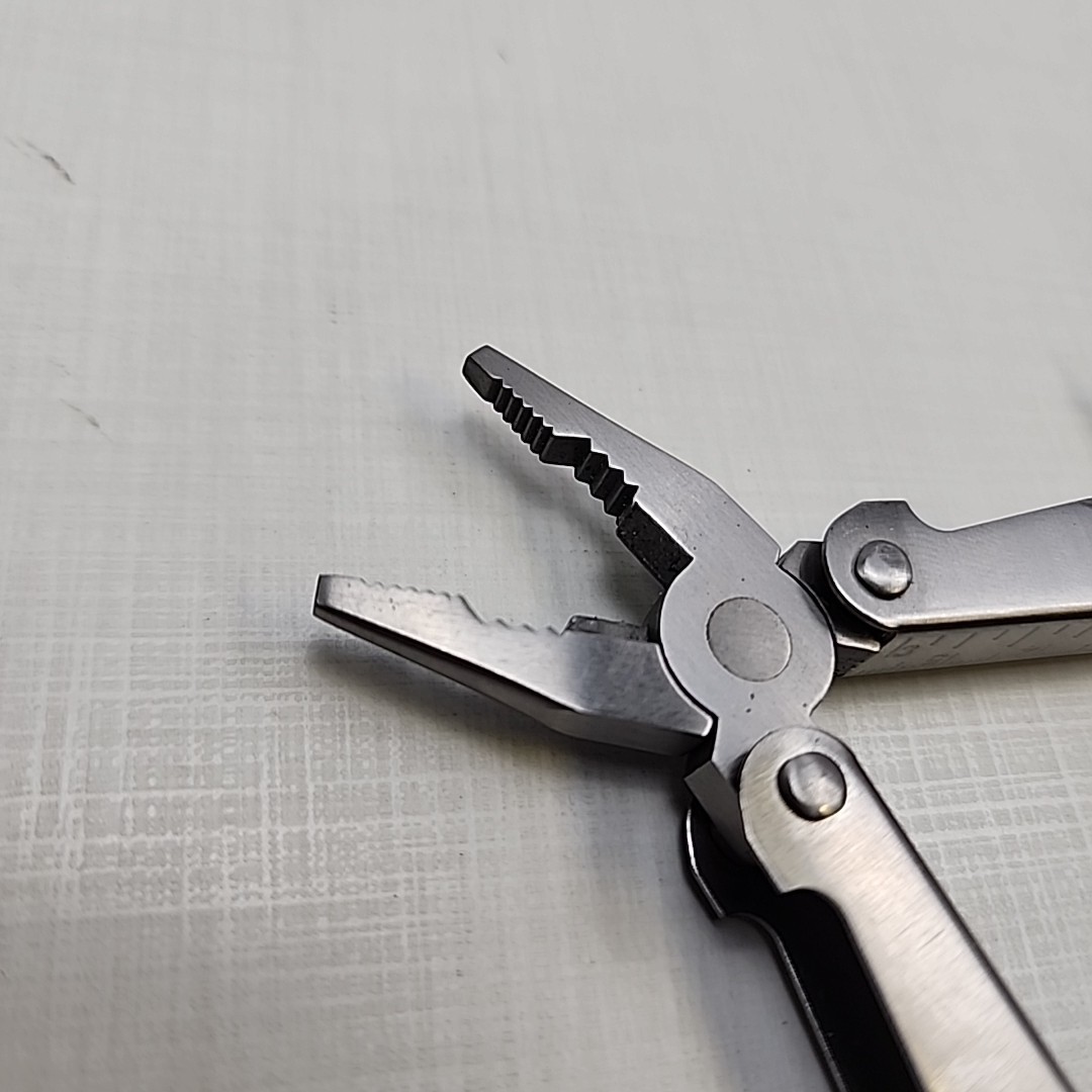 Pocket multi tool unbranded, plier, knife, file, screw drivers, awl, can opener
