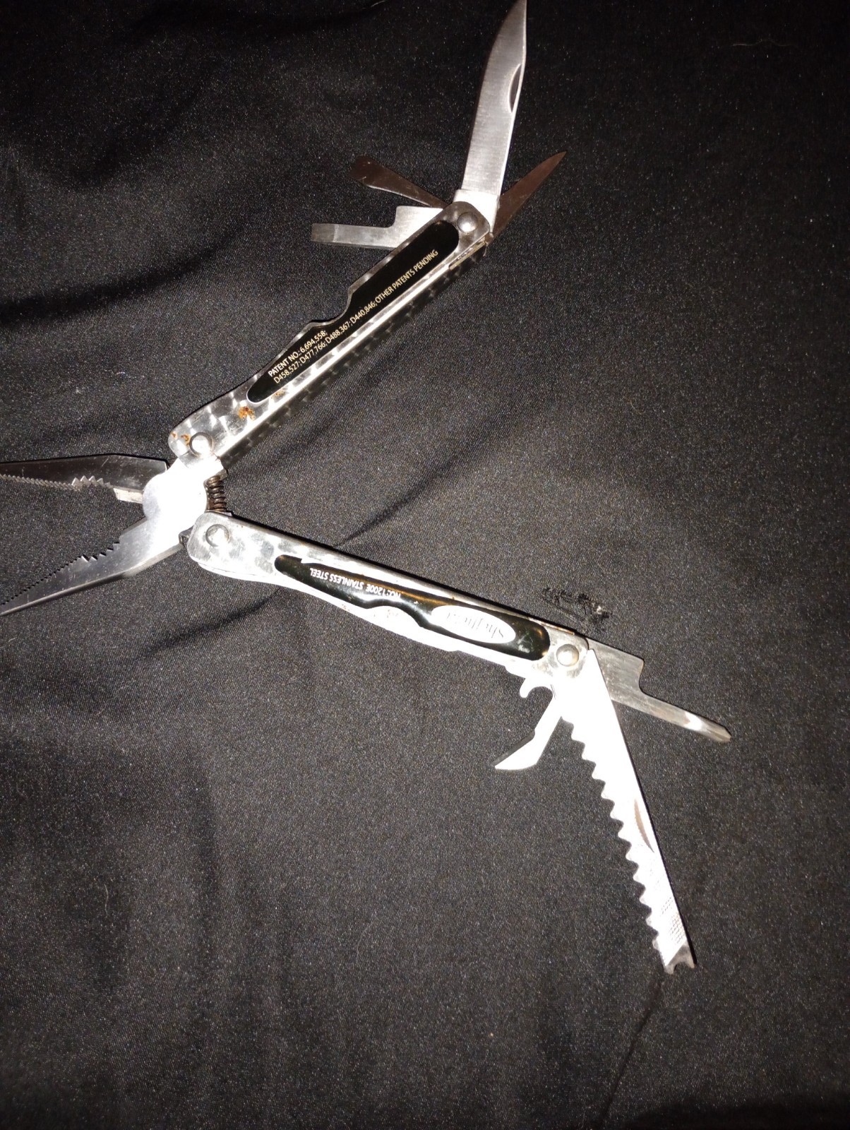 SHEFFIELD #1200E STAINLESS STEEL FOLDING PLIERS & MULTI TOOL KNIFE SAW Black