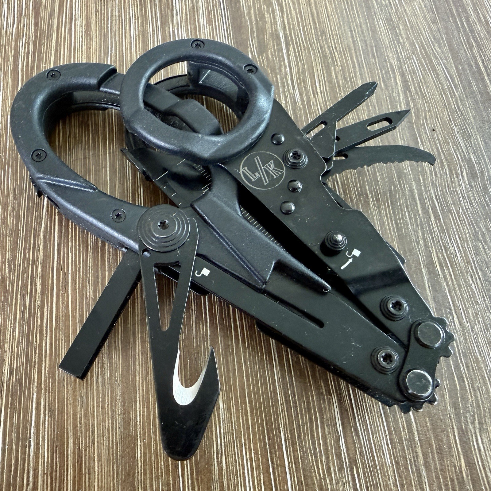 SOG ParaShears tactical emergency shears with a black oxide finish.