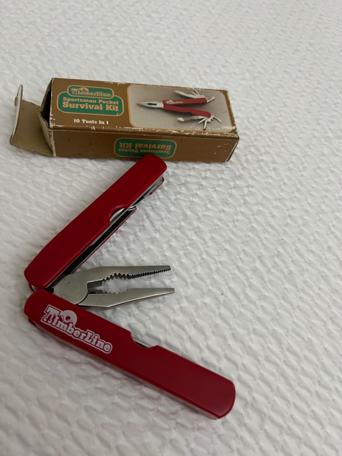 vintage Timberline Sportsman Pocket Survival Kit multi-tool in red
