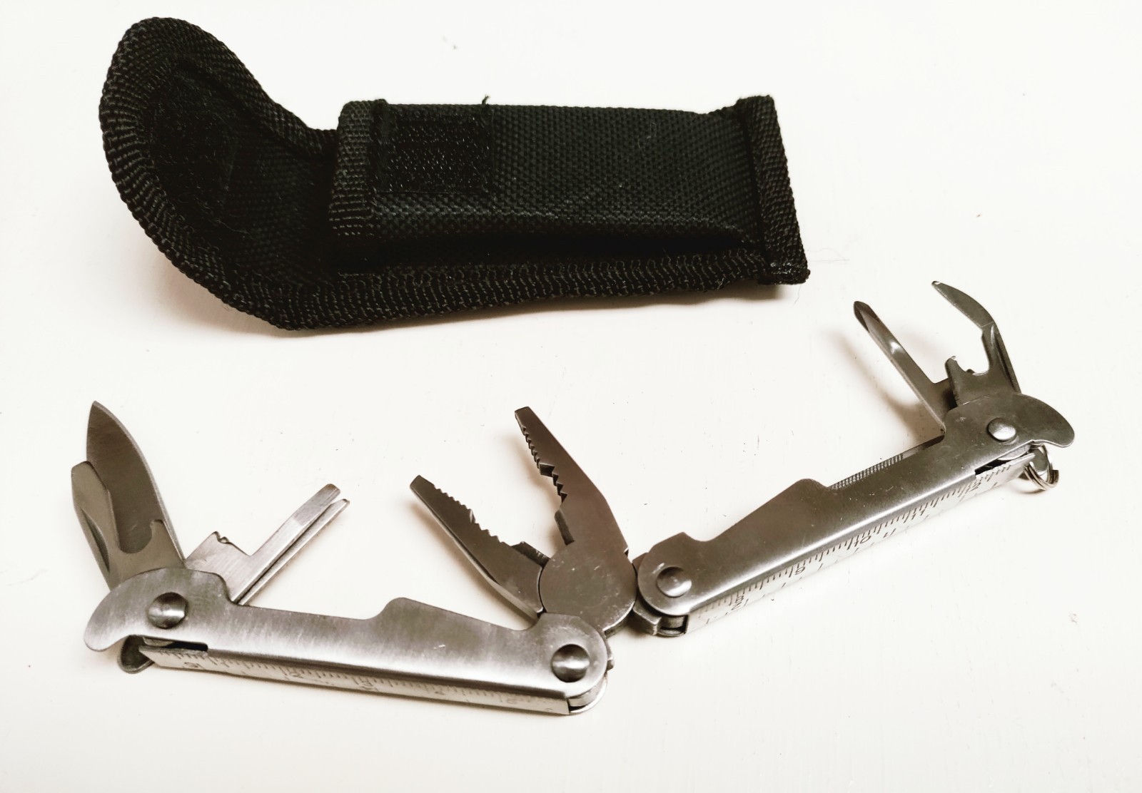 Folding Multi Tool 9 Functions w/ Knife Pliers Screwdrivers NEW IN CASE