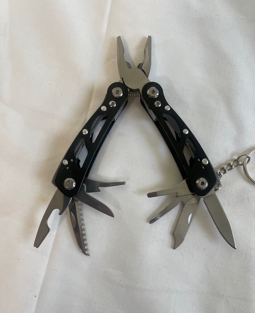 Pocket Size Multitool with Spring-Action Pliers and Saw,