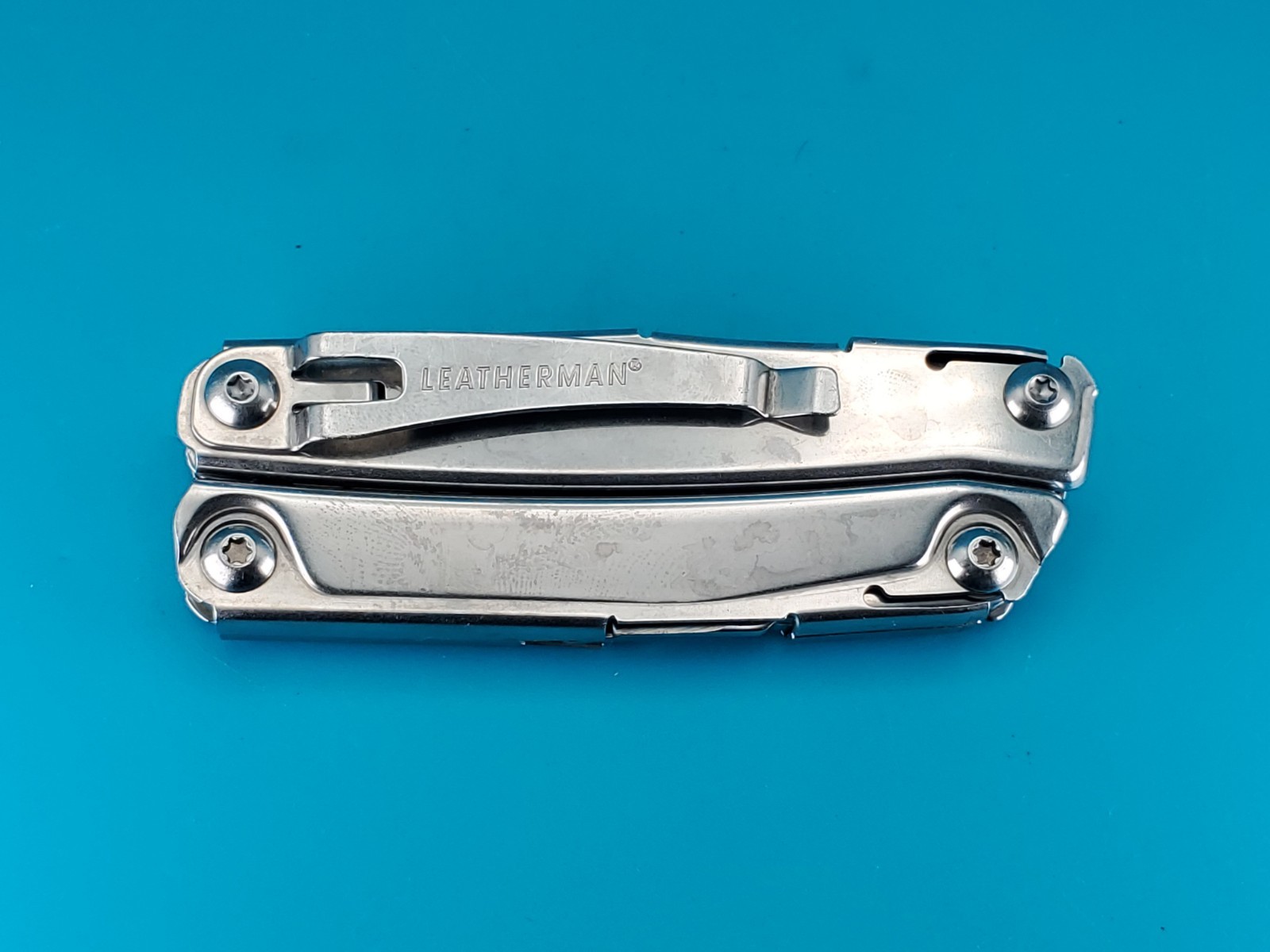 Leatherman Rev 3.8″ Multi-Tool, Stainless! *SOME RUST ON ITEM*