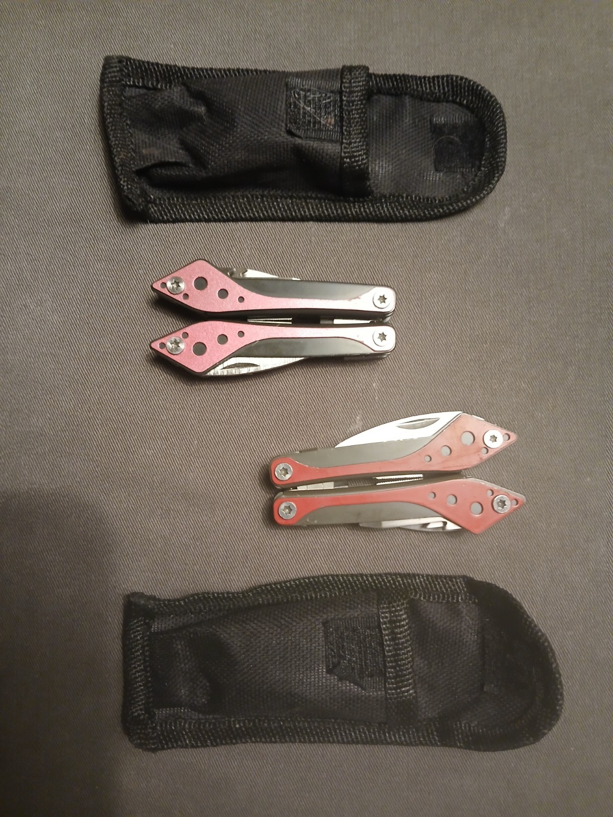 Lot 0f 2 Cabela’s Multi-Tool 1) Silver /1) Orange Unused with Cases