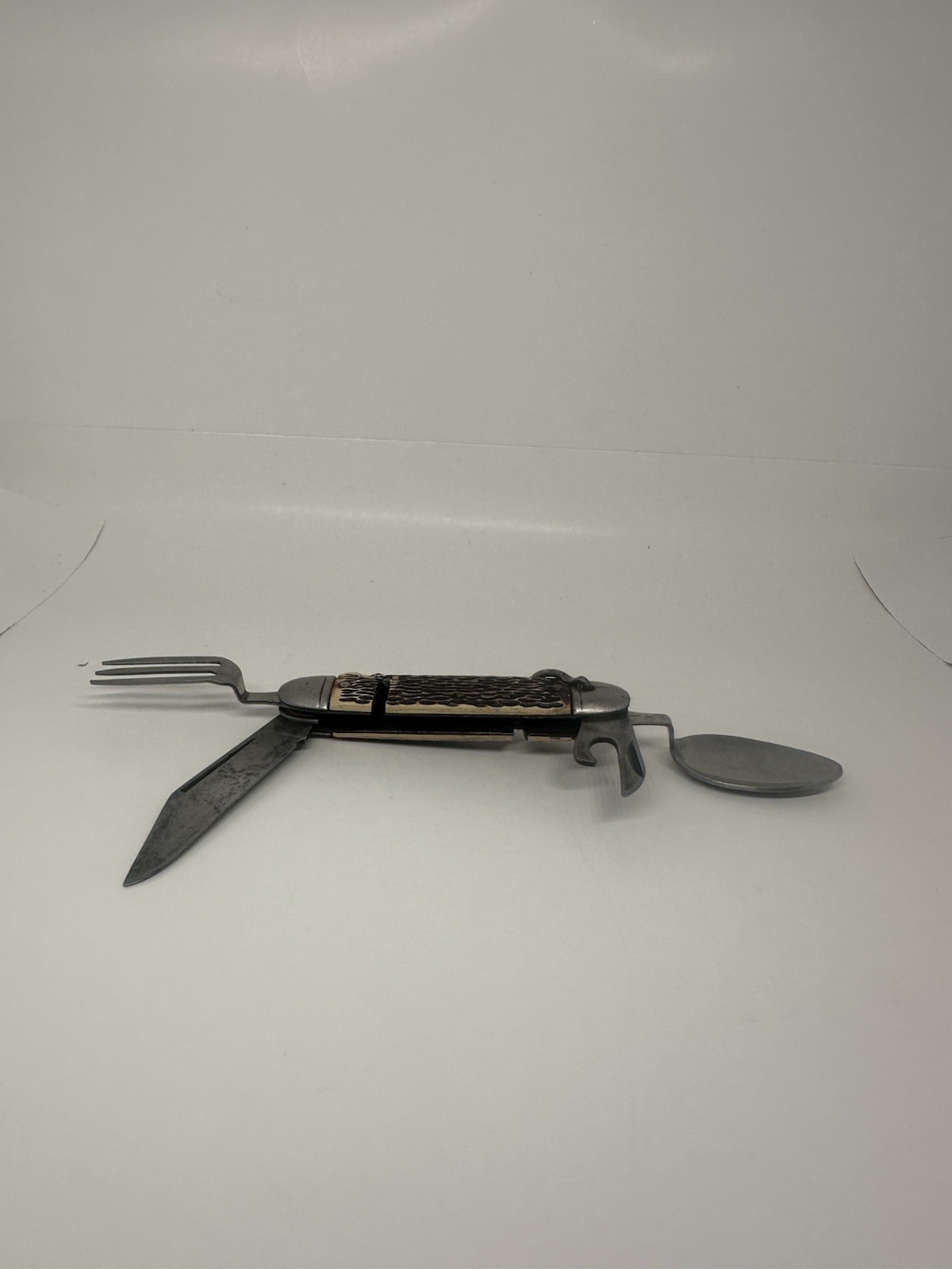 Silver Metal Multi-Tool with Knife, Fork, Spoon, Bottle Opener Straight Edge