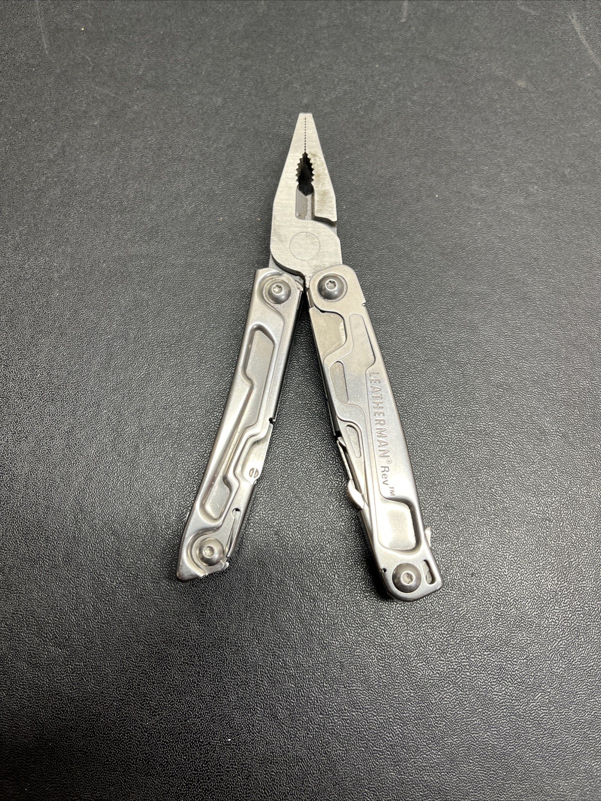 Leatherman Rev Pocket Size Carry-on Stainless Steel Multi-tool, & Engraved