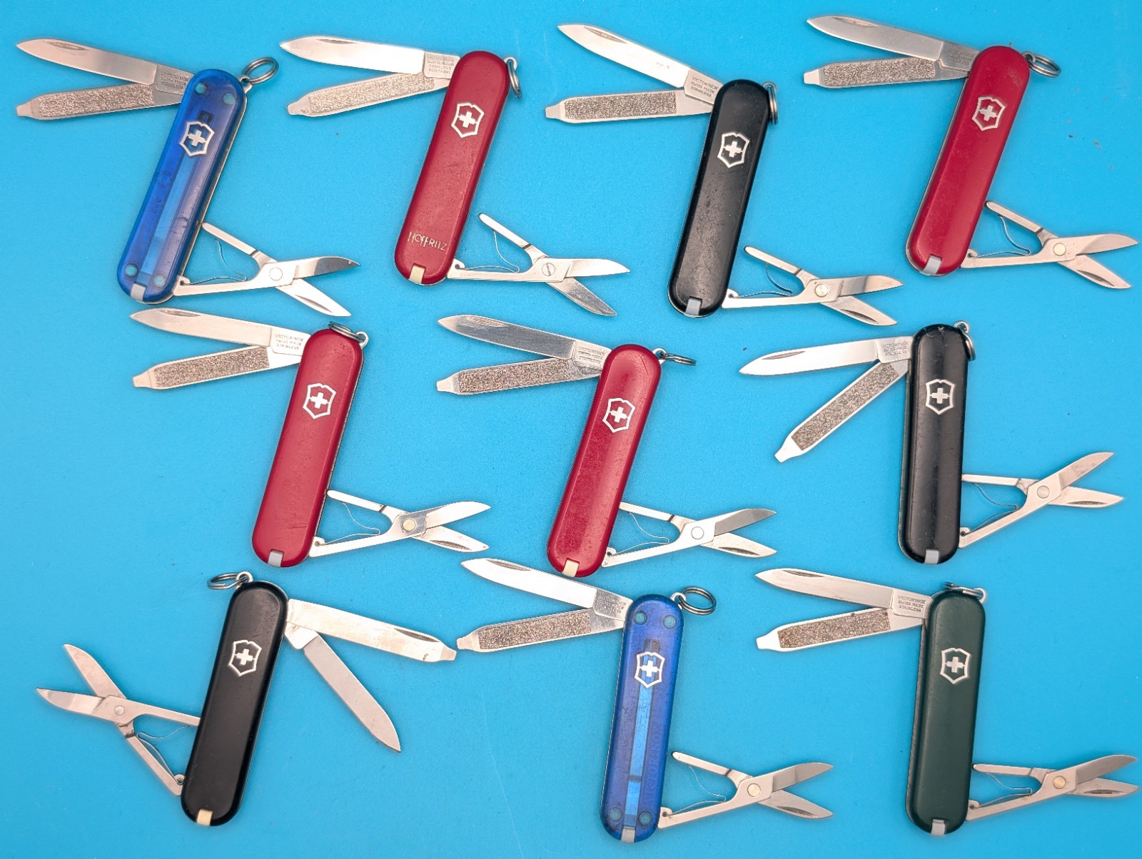 Lot of 10 Victorinox Classic Swiss Army Knife Multi Tools!