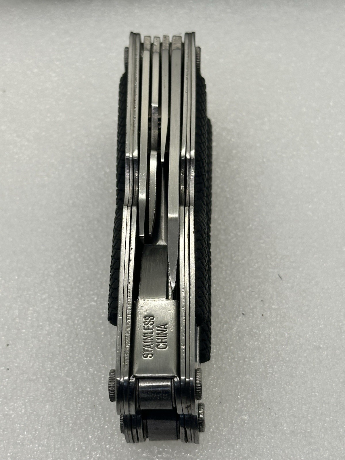 9-in-1 Stainless Steel Multi-Tool Pliers with Knife Screwdrivers Ruler