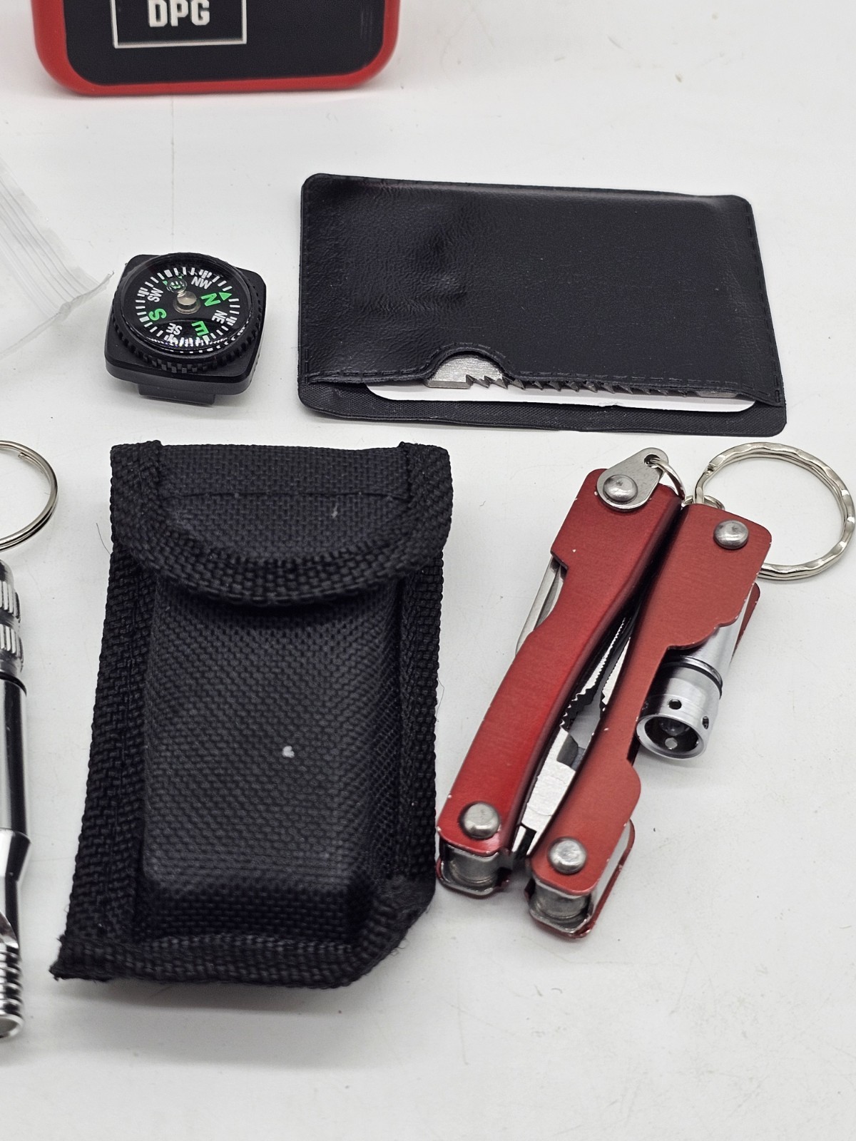 DPG Survival Pack MultiTool Card Compass Wire Saw Flint Whistle