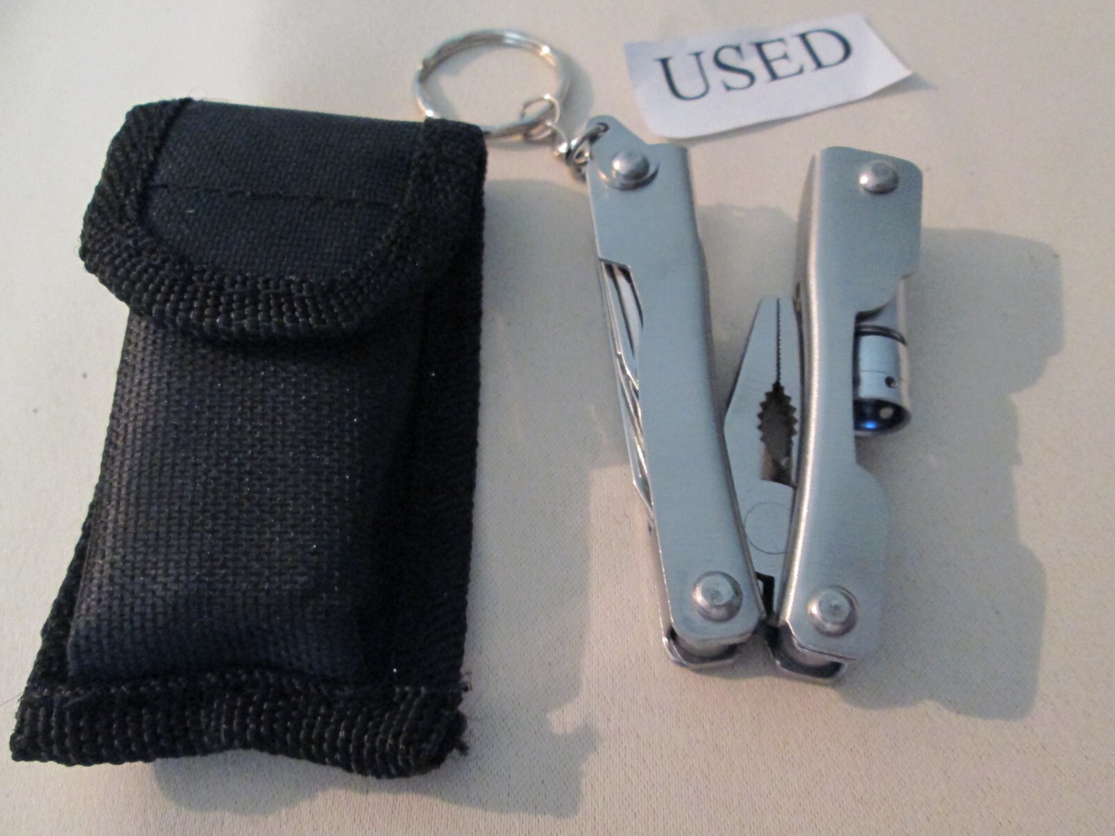 Pocket Multi Tools Flashlight Keychain (needs batteries)