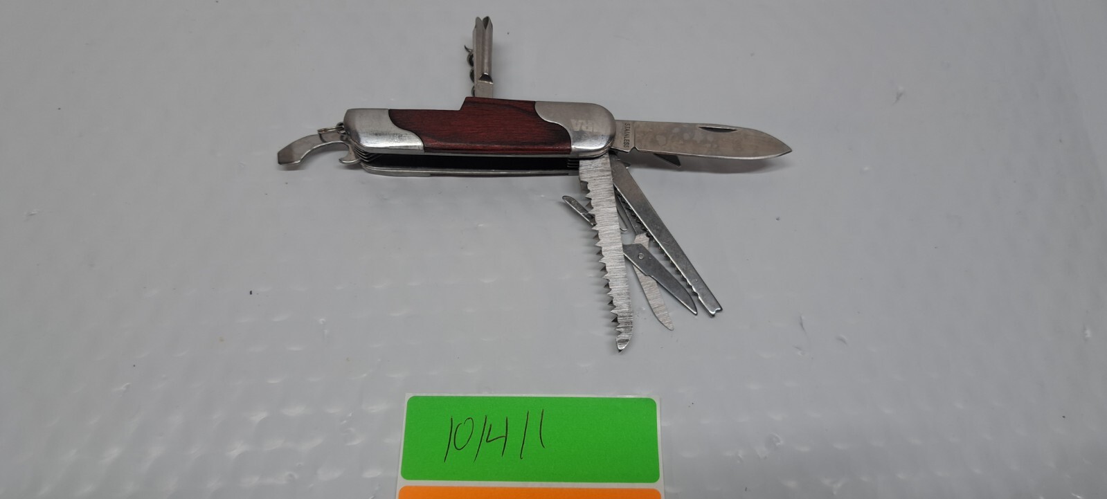 NRA LOGO SS MULTI TOOL WITH 12 TOOLS AND LANYARD LOOP 10/4/1