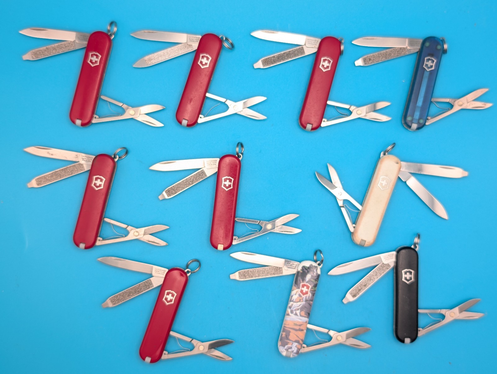Lot of 10 Victorinox Classic Swiss Army Knife Multi Tools!