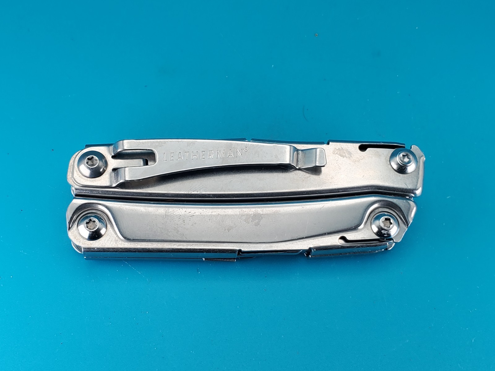 Leatherman Rev 3.8″ Multi-Tool, Stainless! *SOME RUST ON ITEM*