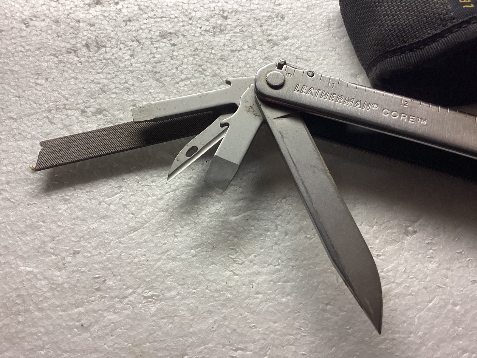 VINTAGE LEATHERMAN CORE MULTITOOL with nylon case.