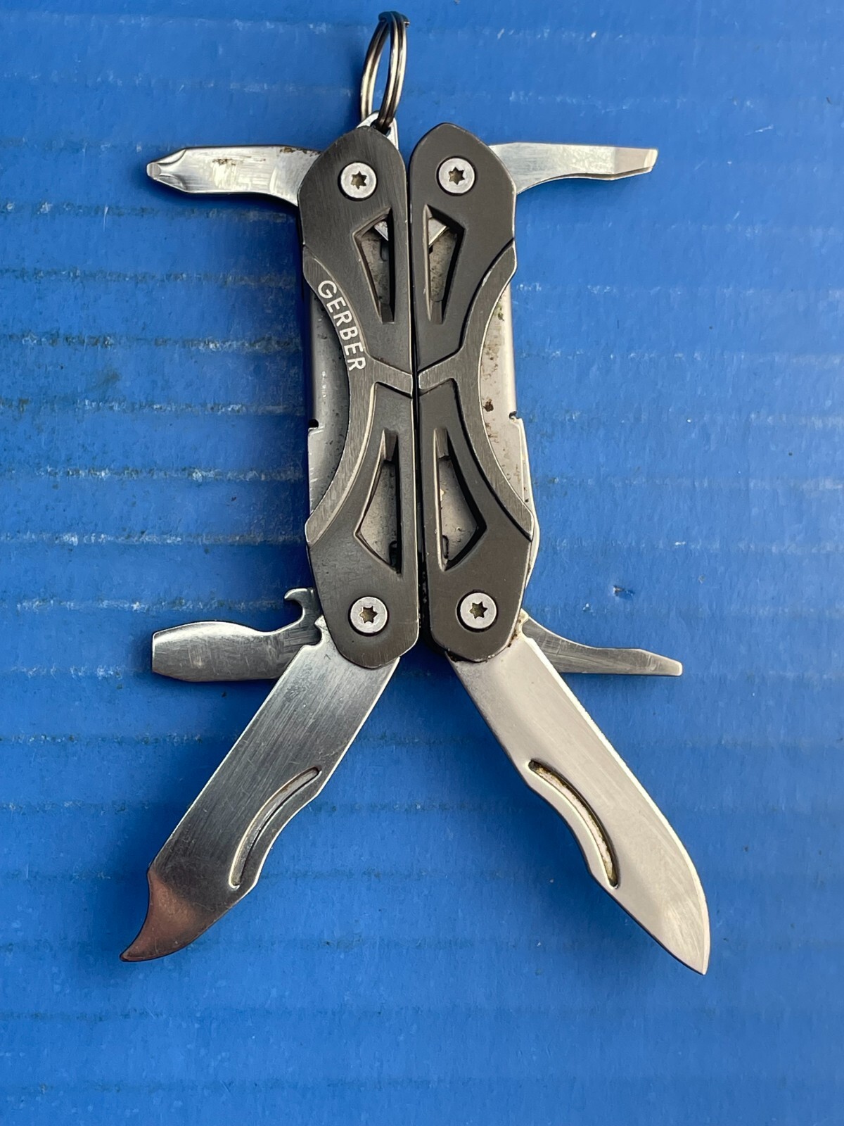 Gerber Clutch Multi-Tool Knife – Nail File – Pliers – Screwdrivers- Tweezer