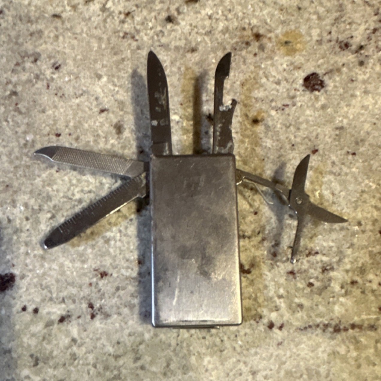 Silver Stainless Steel Multi-Tool, 5 Tools: Knife, File, Scissors, Opener