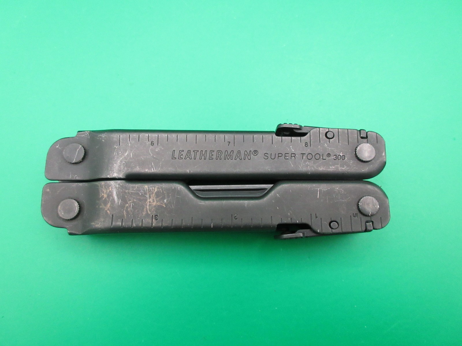 Leatherman Super Tool 300 Black Oxide Multi Tool Folding Knife USA #13A