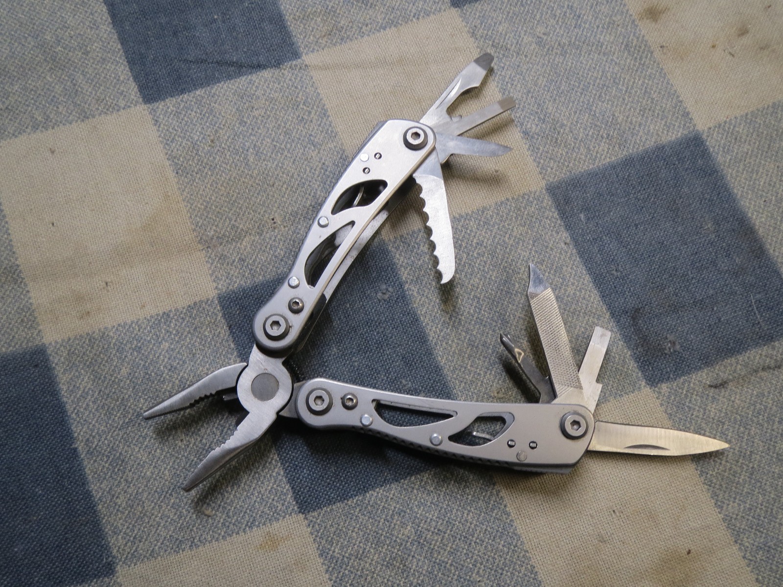 Used Small Stainless Multi-Tool 2 13/16 inch folded length