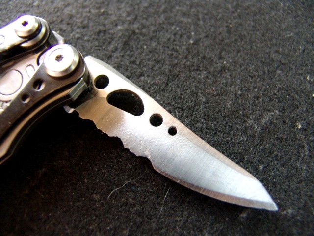 LEATHERMAN SKELETOOL CX–RETIRED–SERRATED–CARBON FIBER TRIM–MULTI TOOL