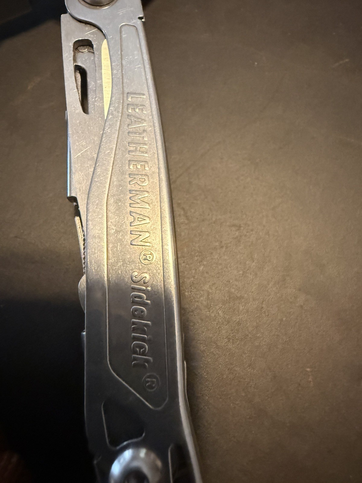 leatherman sidekick multi tool. With old timer genuine leather case. Lanyard
