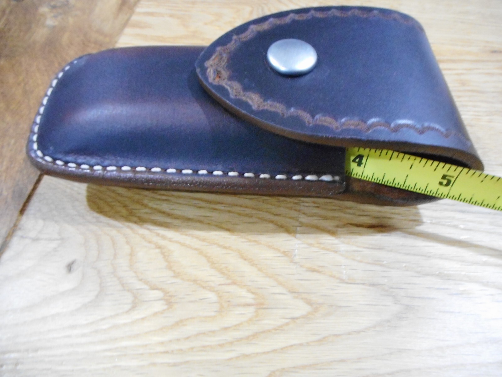 Leatherman Surge. Crazy Horse leather sheath. Tooled flap. Sheath only.