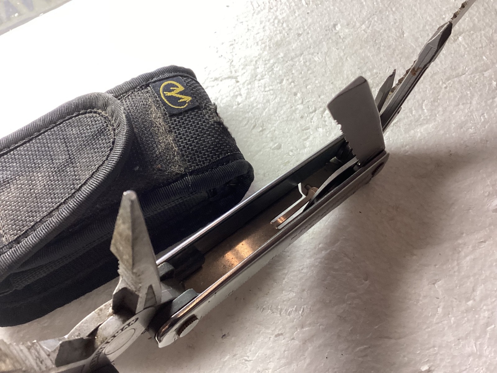 VINTAGE LEATHERMAN CORE MULTITOOL with nylon case.