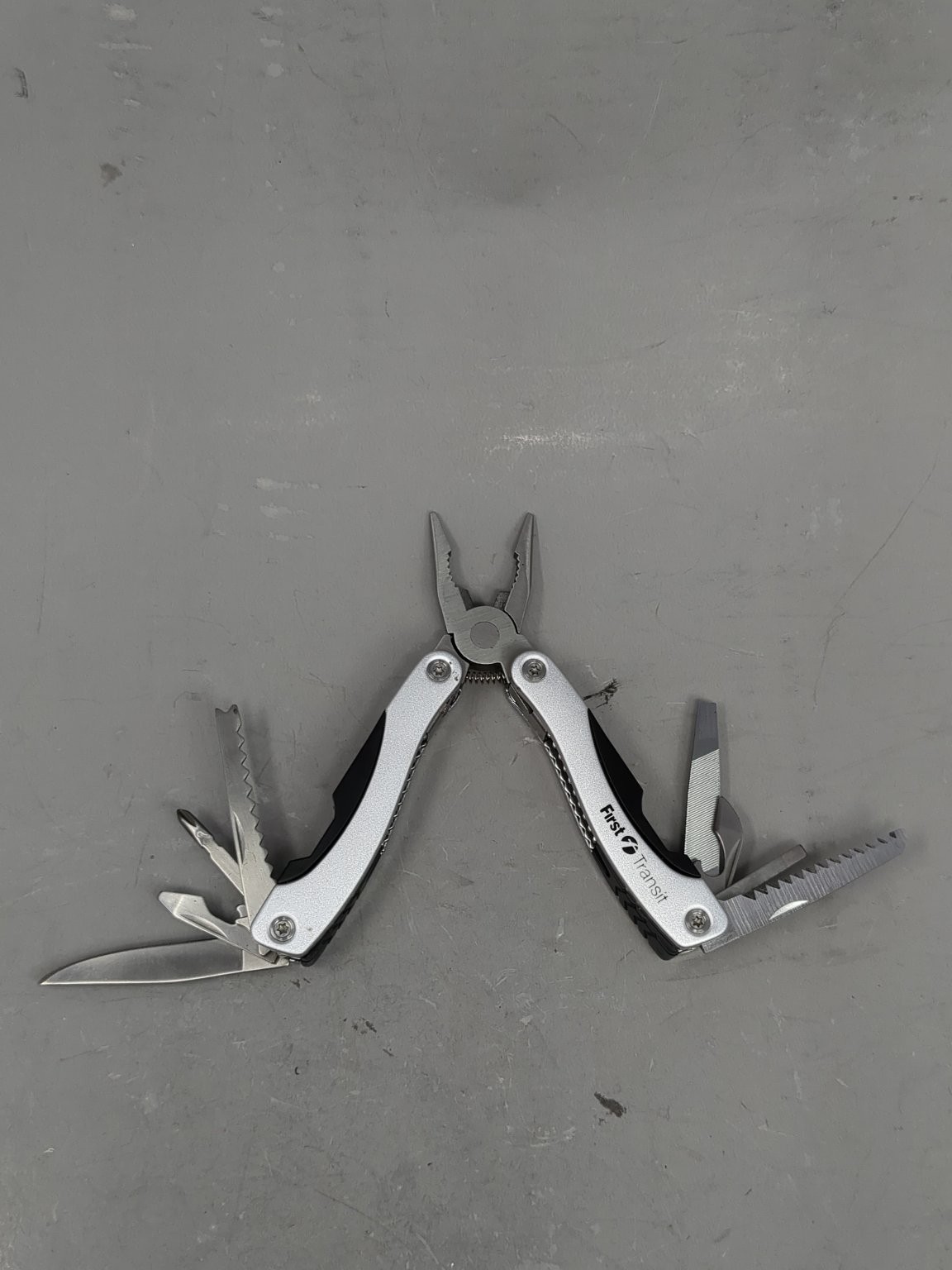 First Transit Multi-Tool Stainless Steel Pliers Knife Saw Screwdriver