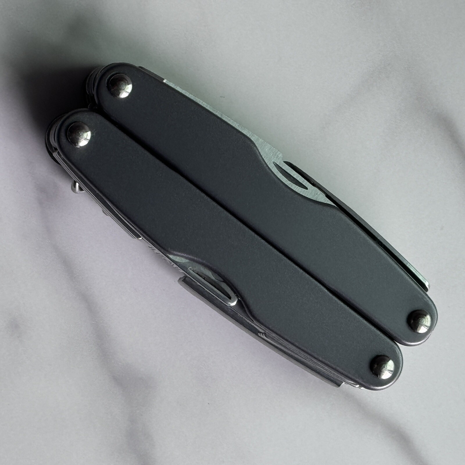 New, Early Leatherman Juice CS4 Storm Gray multitool.