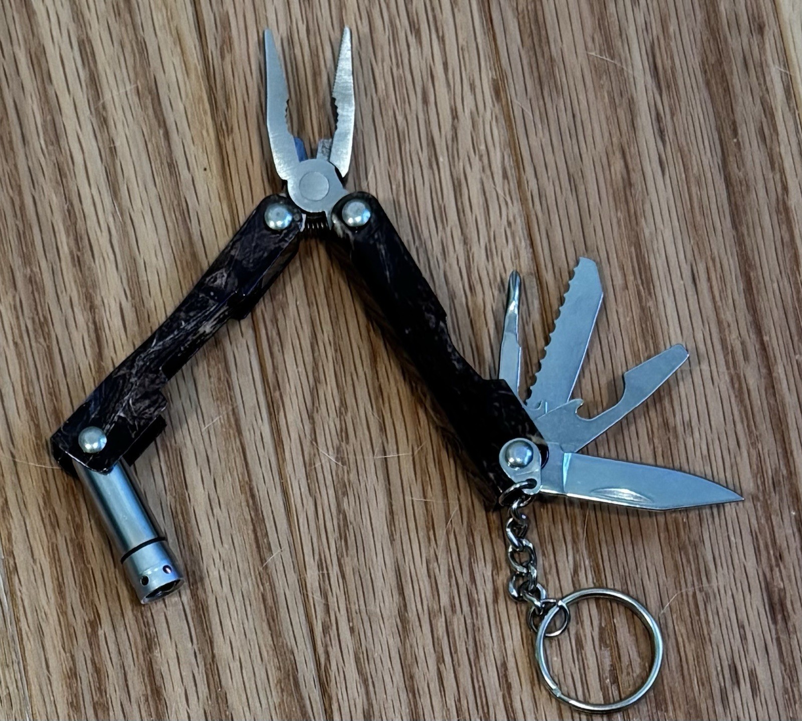 Camouflage Multi-Tool Flashlight Knife Pliers Key Chain Screwdriver Bottle Opene