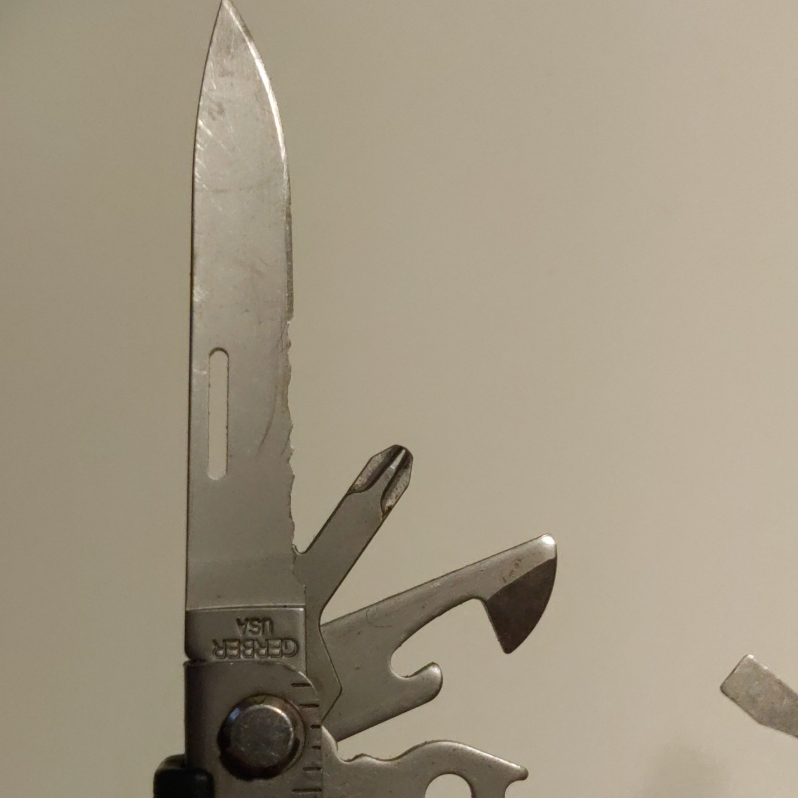Gerber Multi-Tool Stainless Steel Silver Knife File Pliers Bottle Opener Ruler