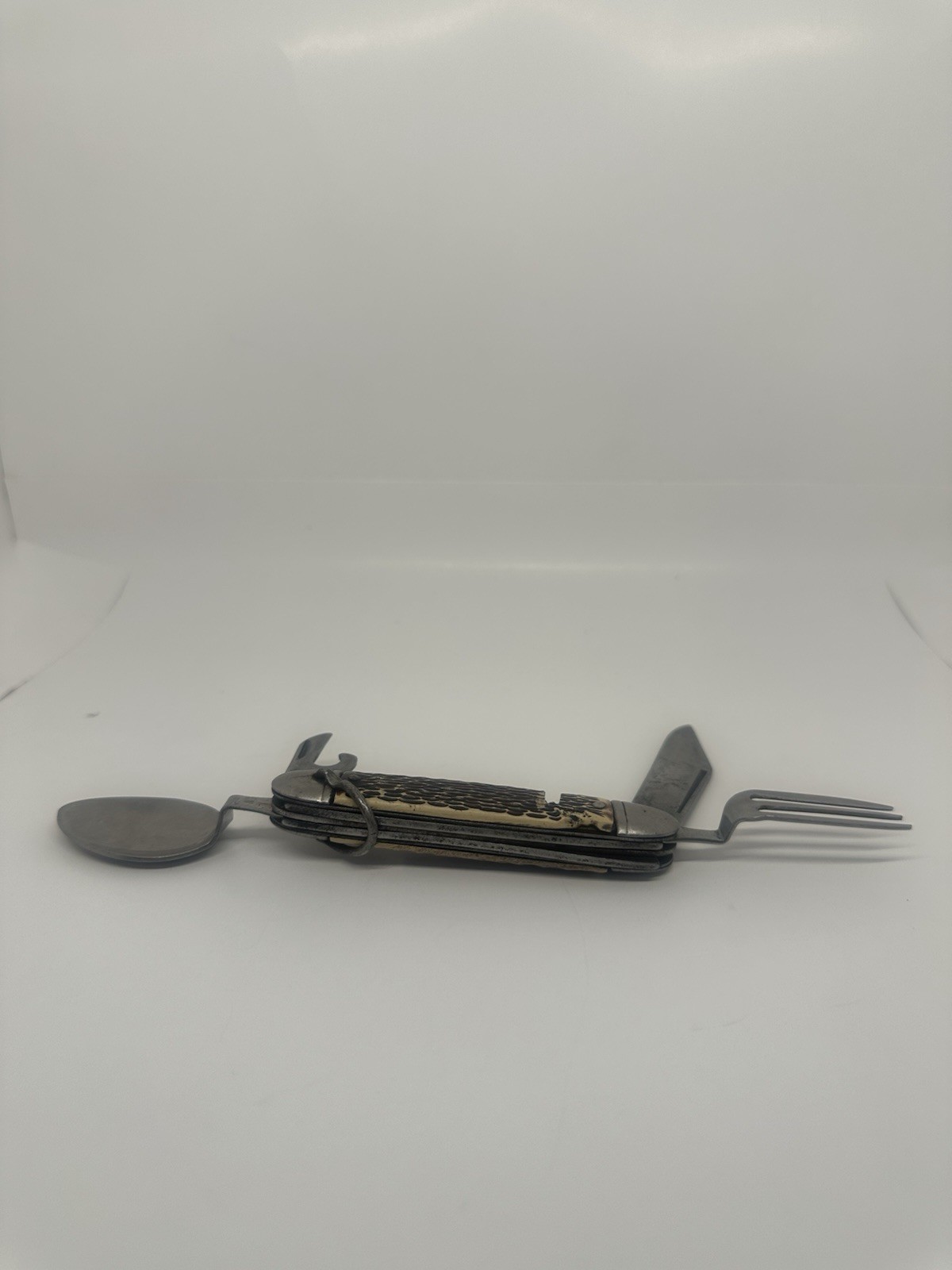 Silver Metal Multi-Tool with Knife, Fork, Spoon, Bottle Opener Straight Edge
