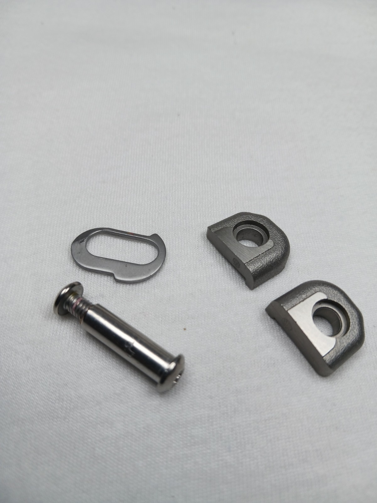 Leatherman Wave handle end caps with lanyard ring and pivot.