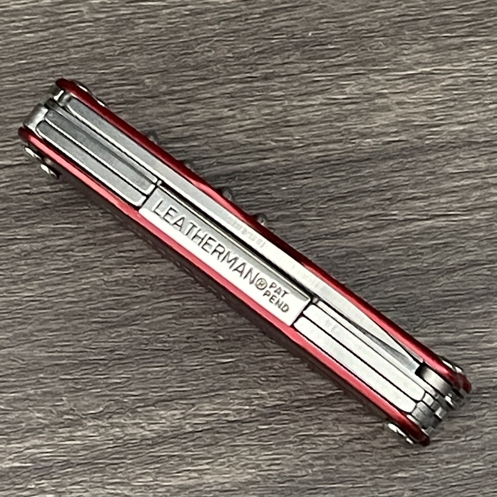 TWO Leatherman Juice C2 Red multitools. TM variants. Discontinued