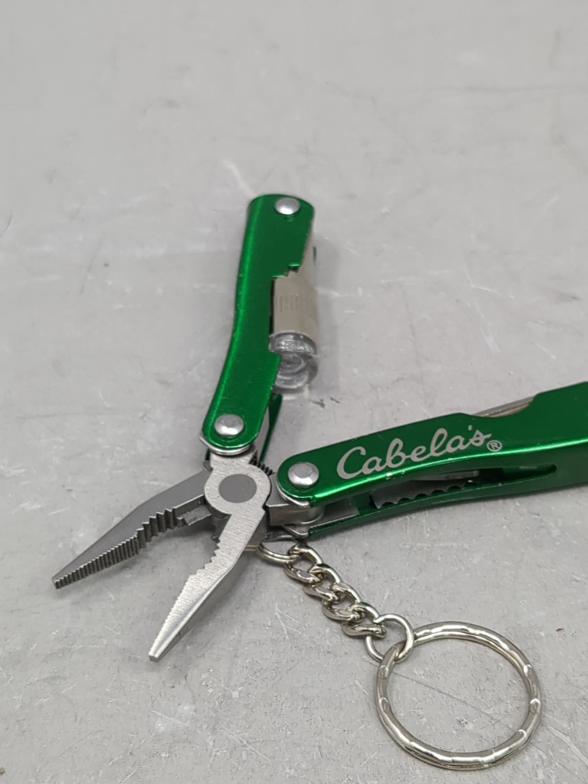 Cabela’s Green Multi-Tool with LED Light Pliers Knife Keychain * Needs Battery *