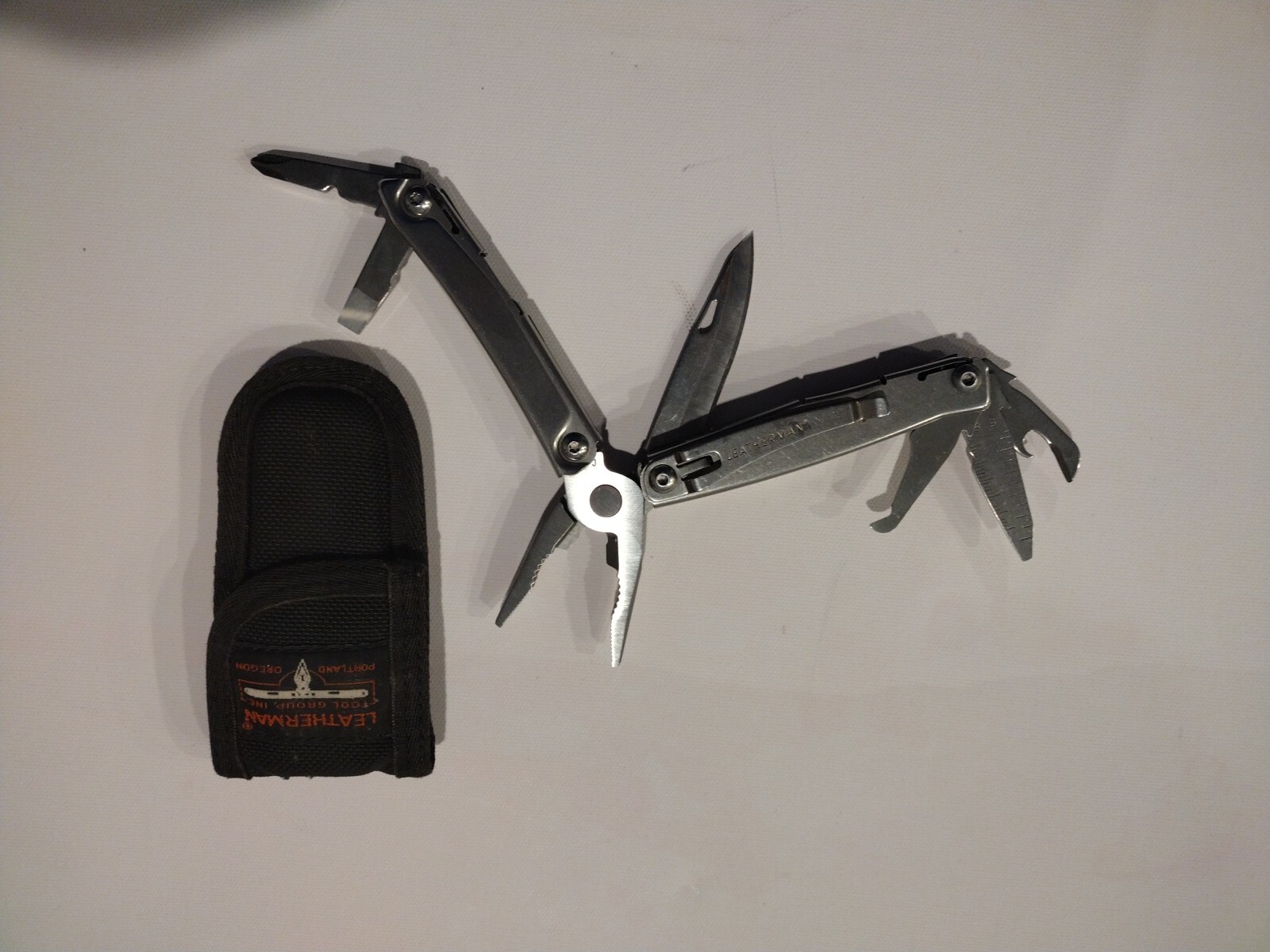 Leatherman REV 14 Tools Multi-Tool – Stainless Steel with Nylon Sheath Excellent