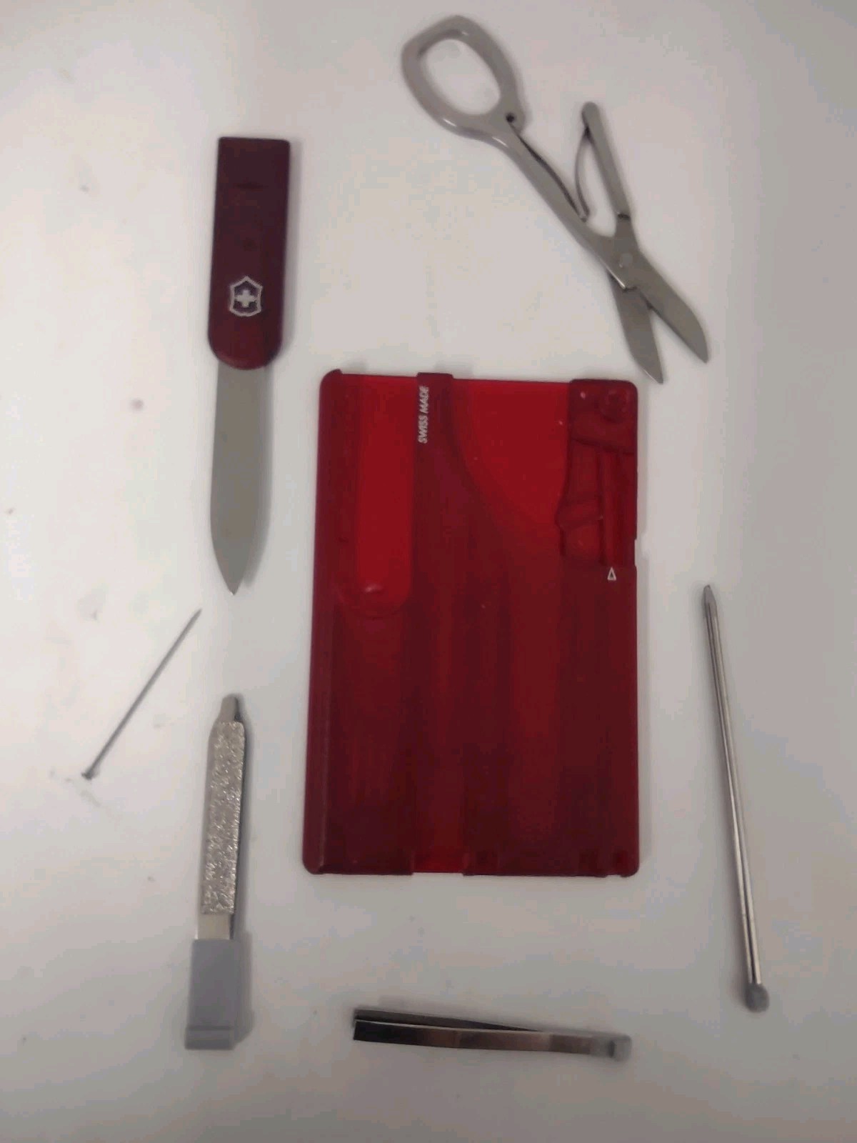 Victorinox Red Multi-Tool Swiss Made Knife, Scissors, Tweezers, File, Pin