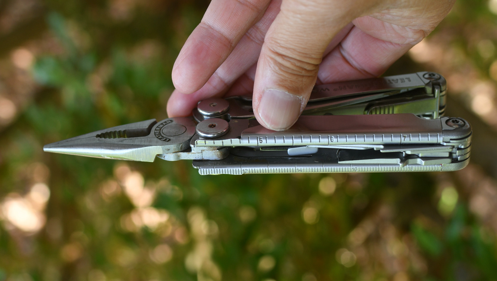 LeatherMan Wave Pocket Knife  Blades Rust