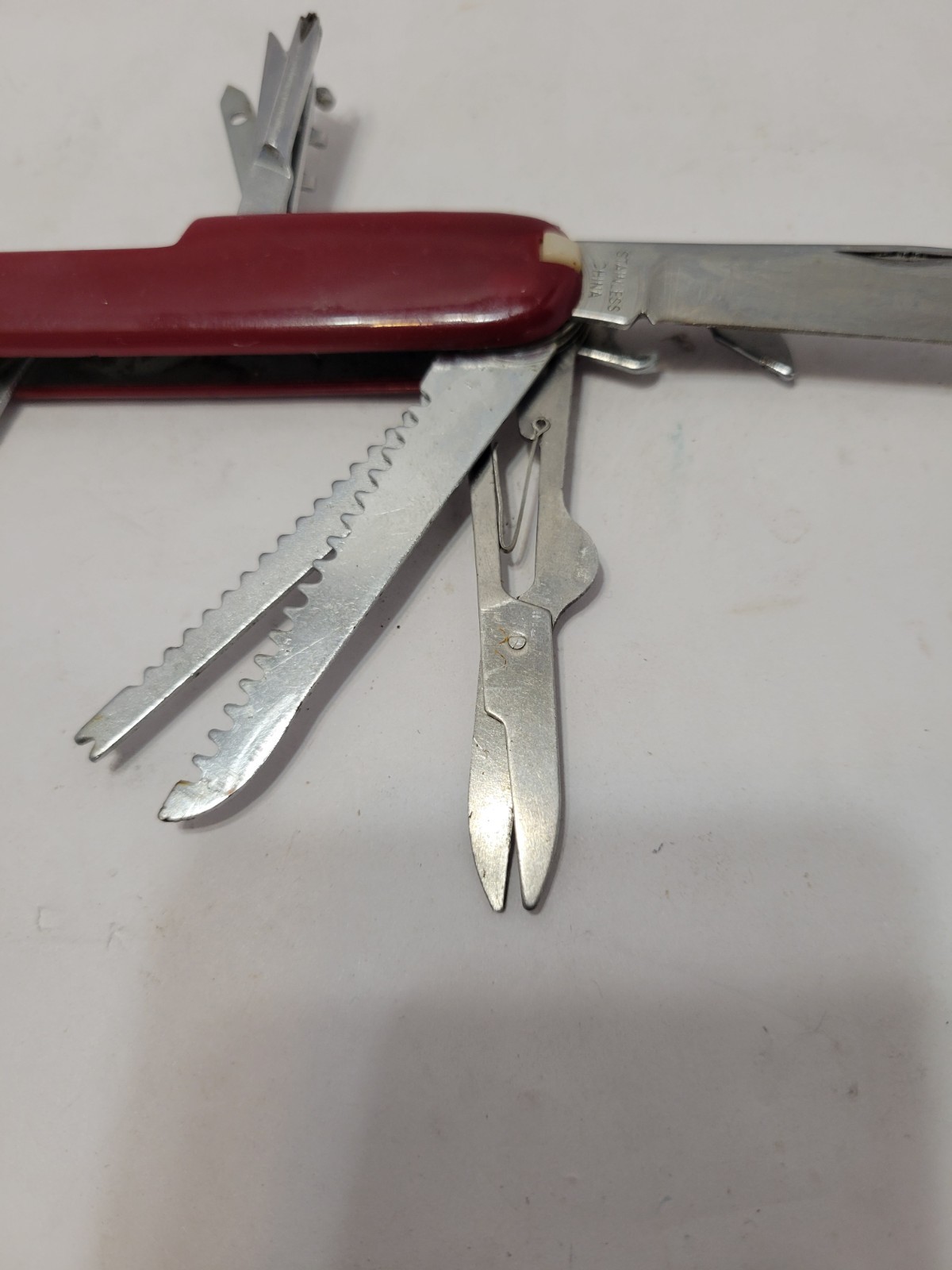 Red Multi-Tool Knife with Scissors, Serrated Knife, Corkscrew, Bottle Opener