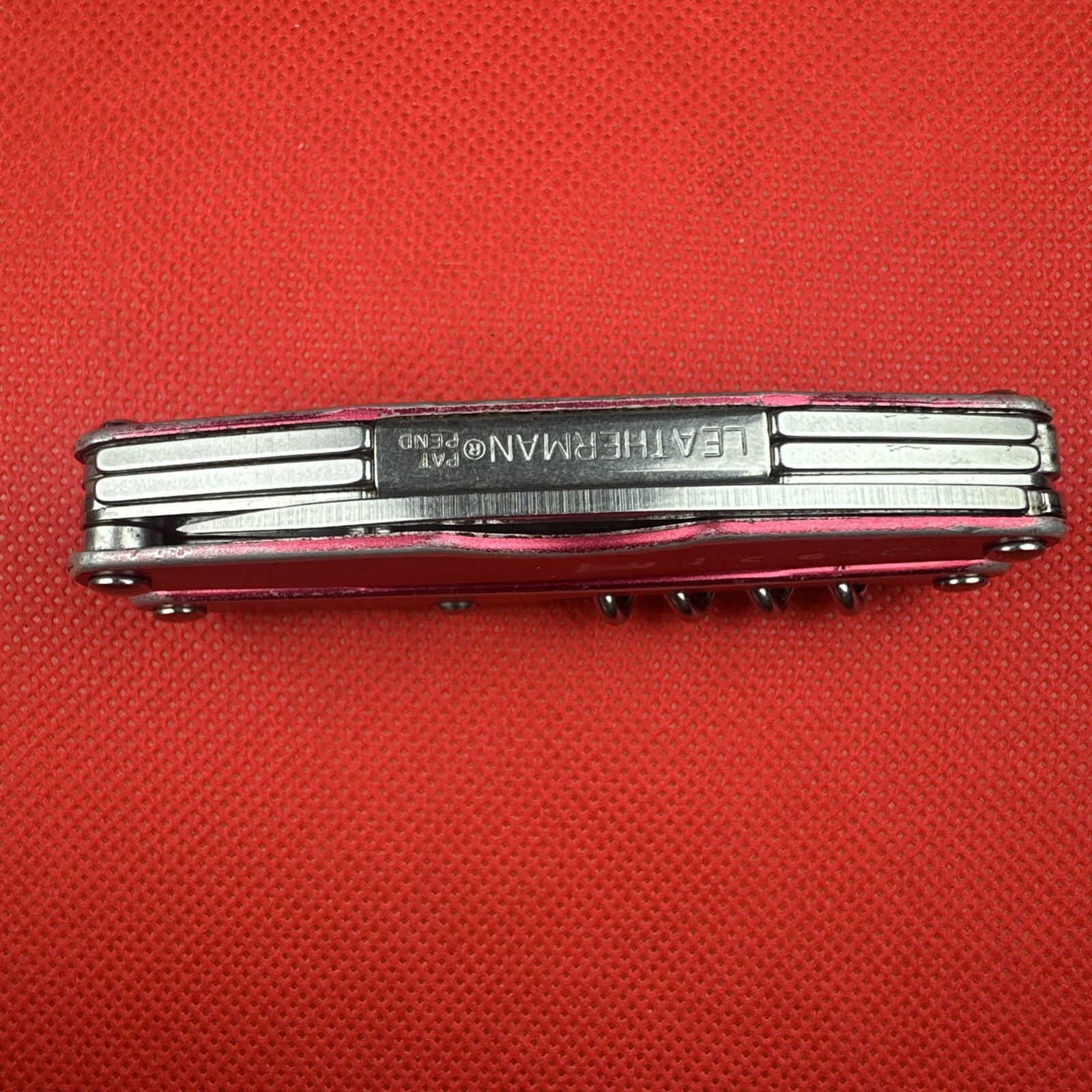 Retired Pat. Pending Gen 1 Red Leatherman Juice C2 Multitool. Great EDC!