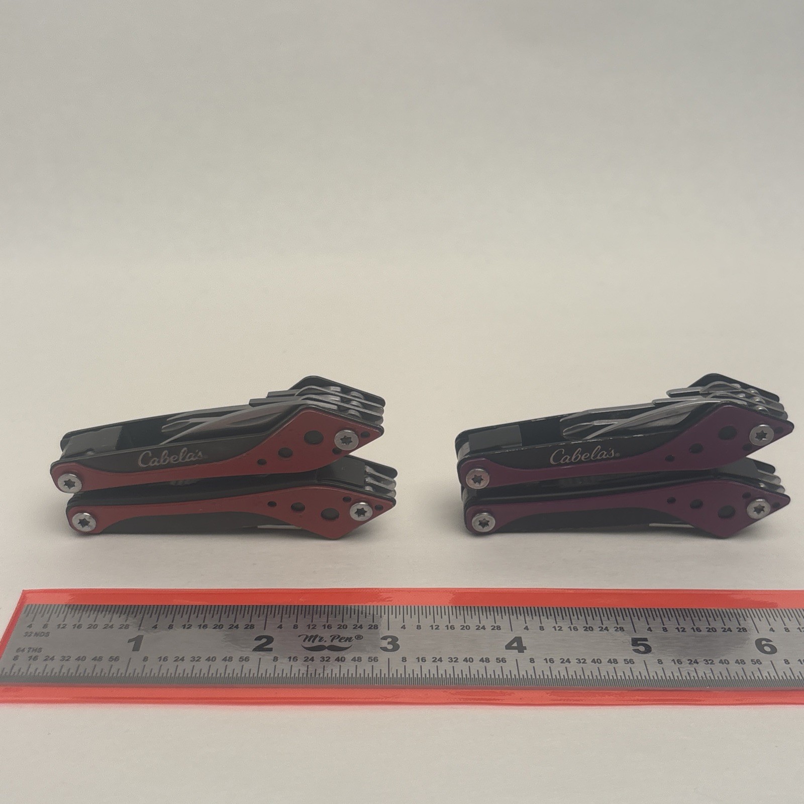 Cabela’s Lot Of 2 Purple Red 7-in-1 Small MultiTool Camp Hunt Fish Hike EDC