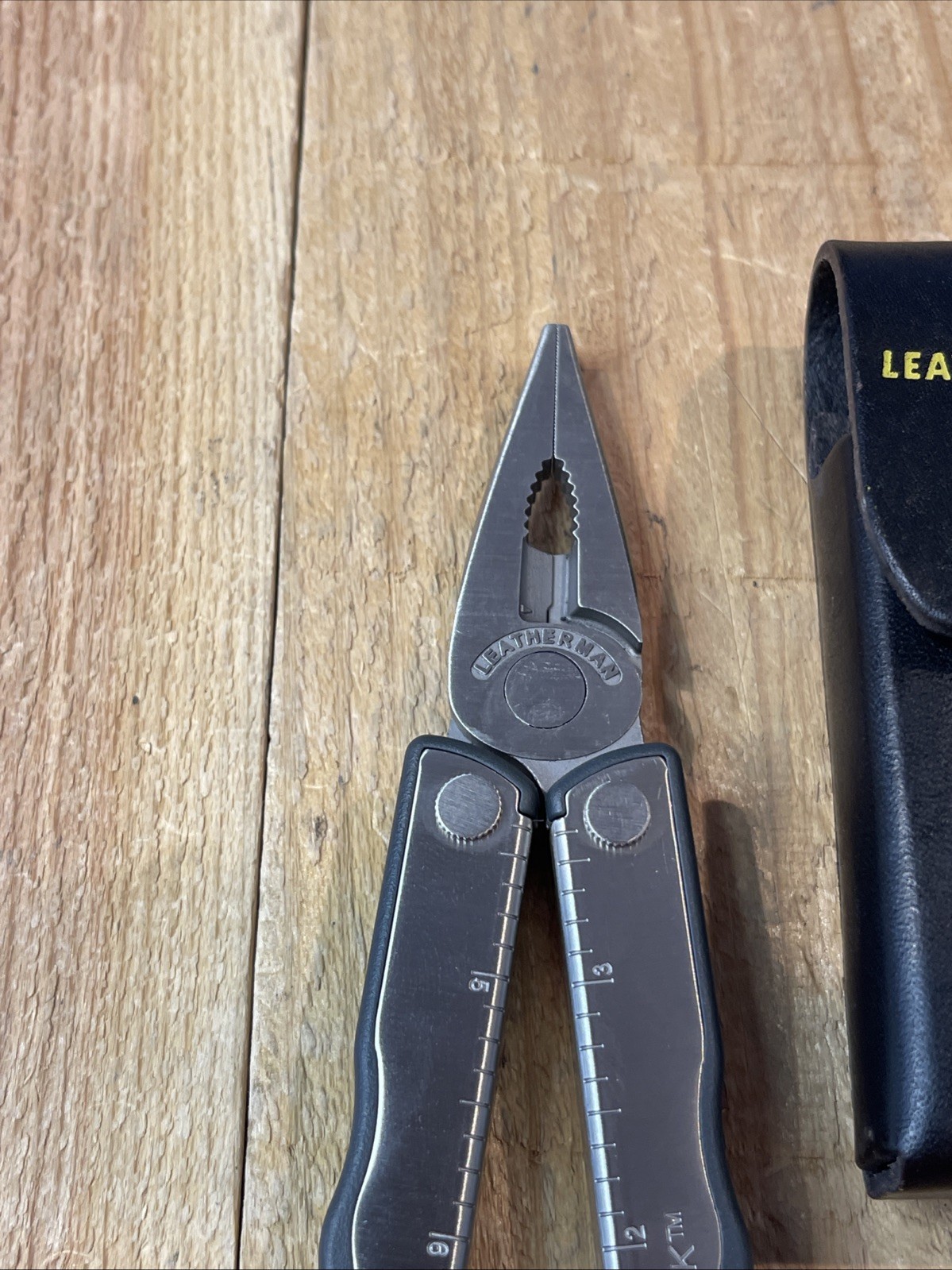 Leatherman KICK multitool. New, with vintage Leather Snap belt sheath Mint Knife