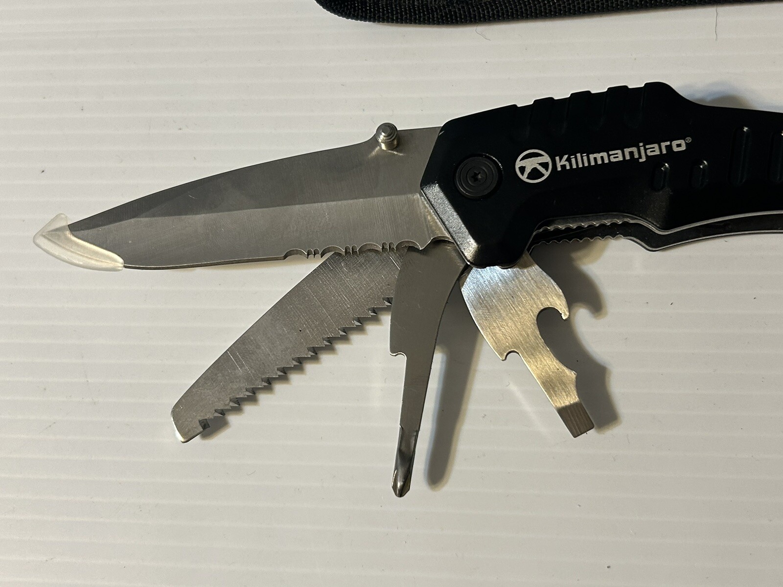 Kilimanjaro Magnus 9-in-1 XL Multi-Tool Folding with Snap Pouch New Never Used.