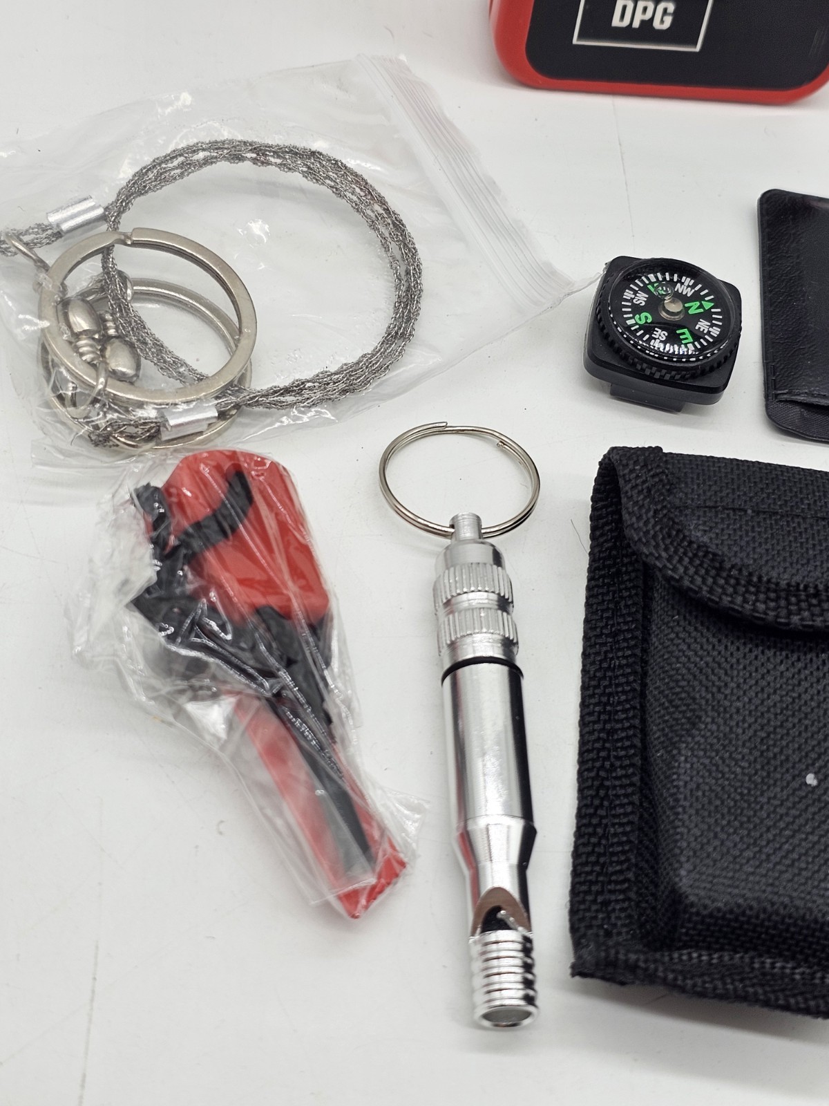 DPG Survival Pack MultiTool Card Compass Wire Saw Flint Whistle