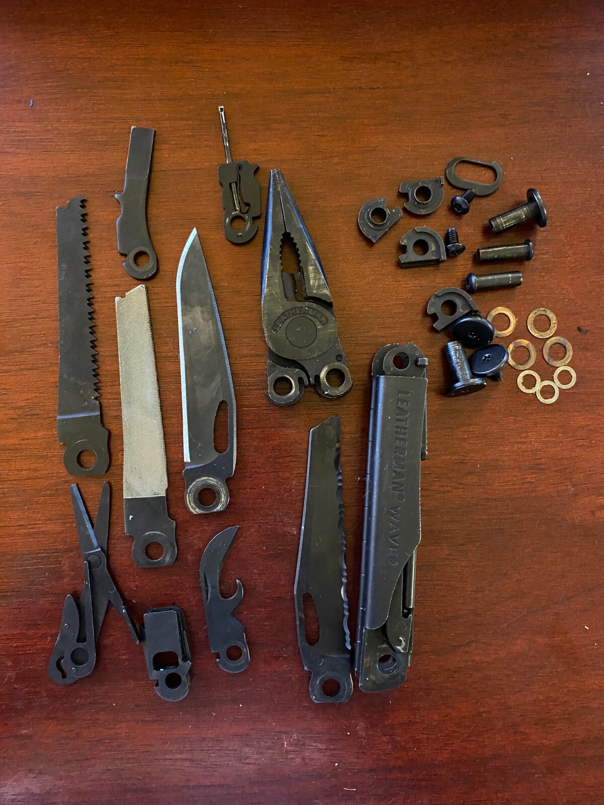 Parts from retired Black Oxide Leatherman Wave Gen 2: 1 Part for mods or repairs