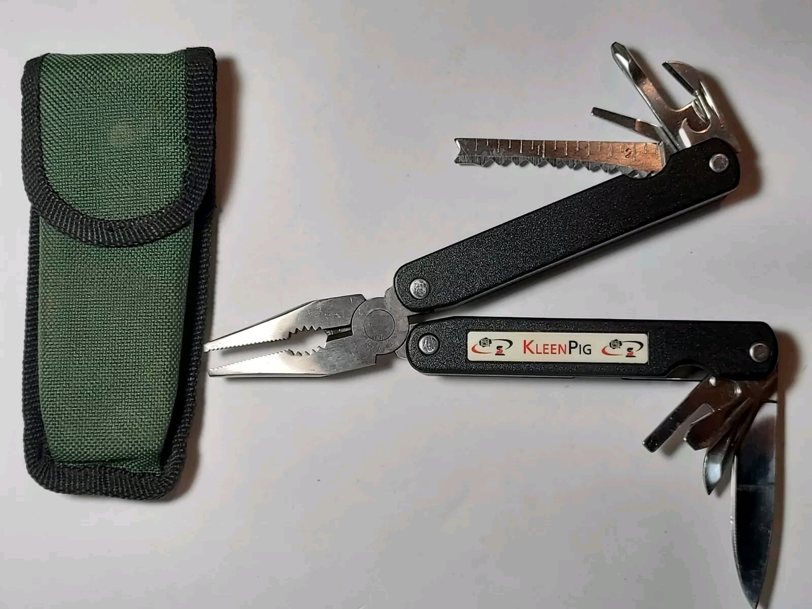 Barlow Multi Tool advertising Kleen Pig with sheath