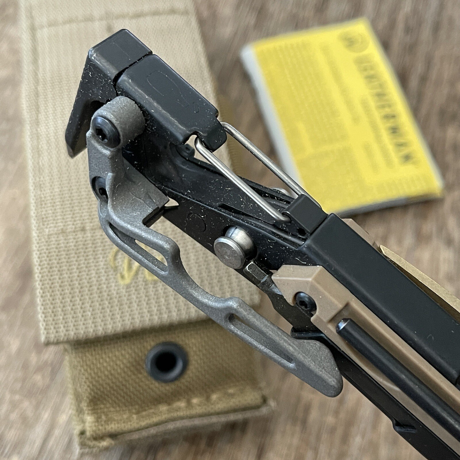 Leatherman MUT Black w/Titanium Clip multi tool, brown sheath. Made 12/2012