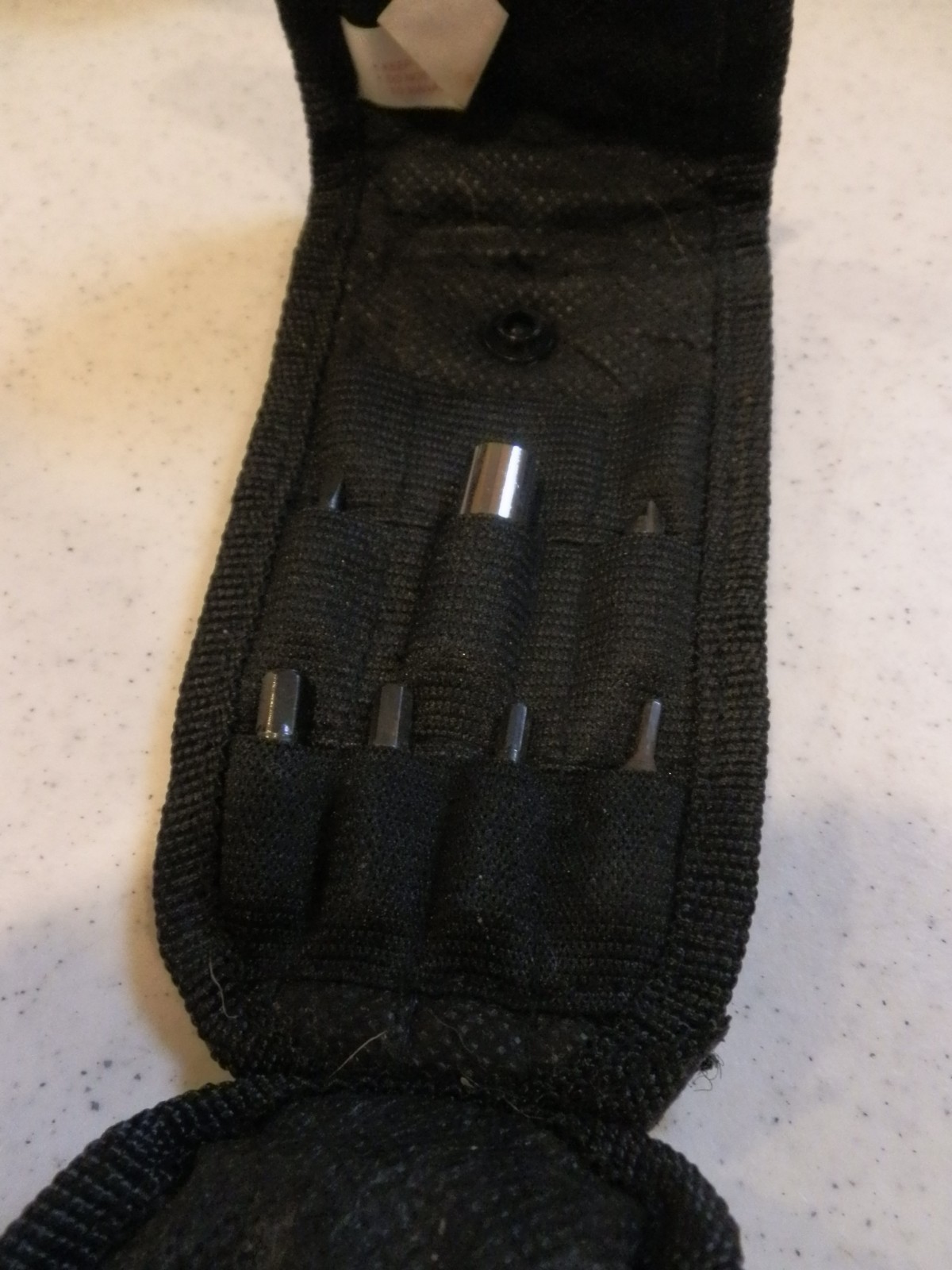 Multitool. Unbranded. Nylon sheath. 8 auxilliary bits – see photos. EUC