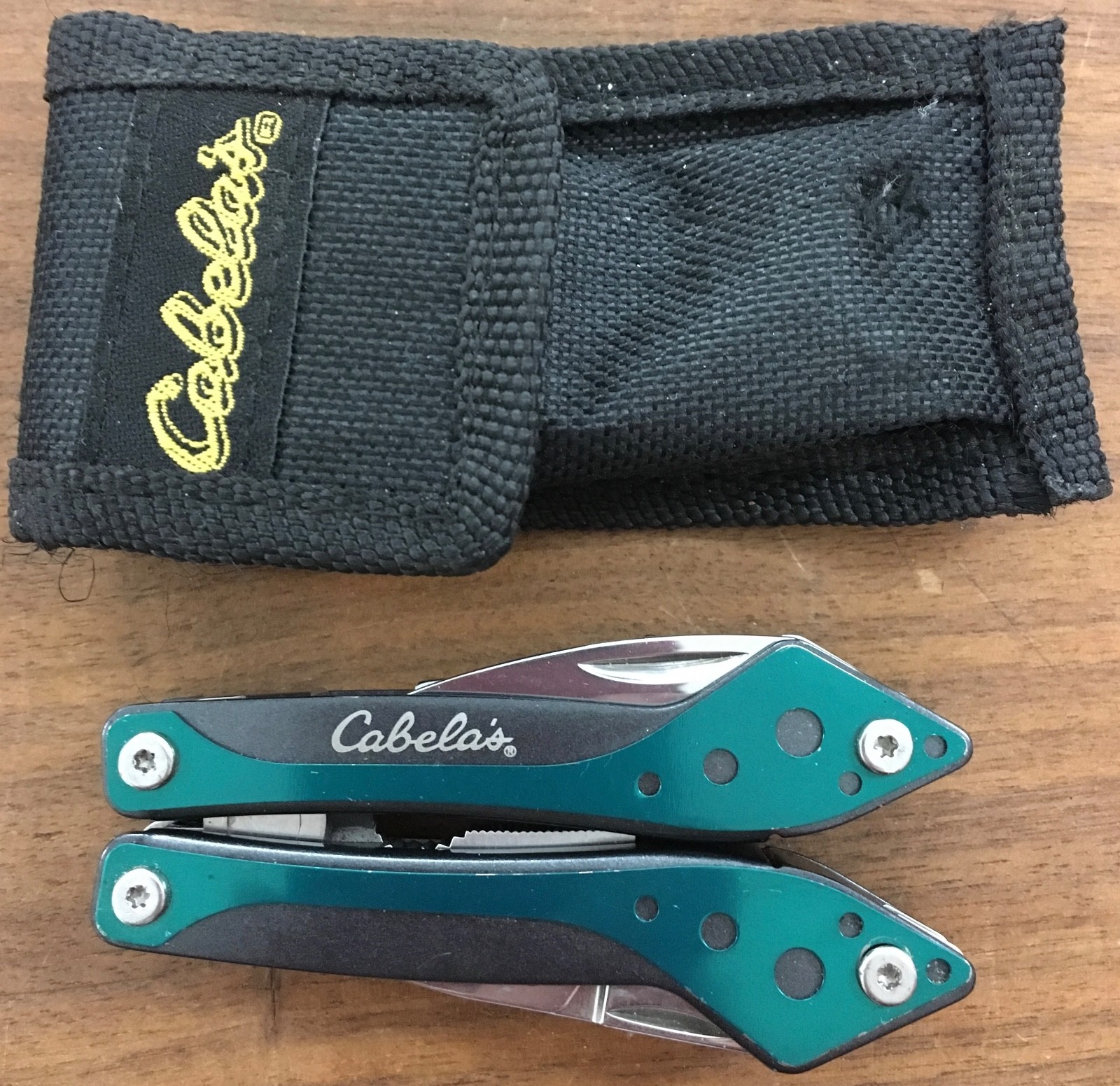 Cabela’s multi tool in hunter green with sheath for camp, hunt, survival, crafts