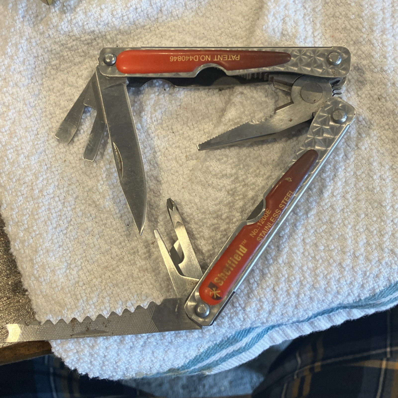 Sheffield 1200E Stainless Steel Multi-Tool Pliers Knife Red Silver