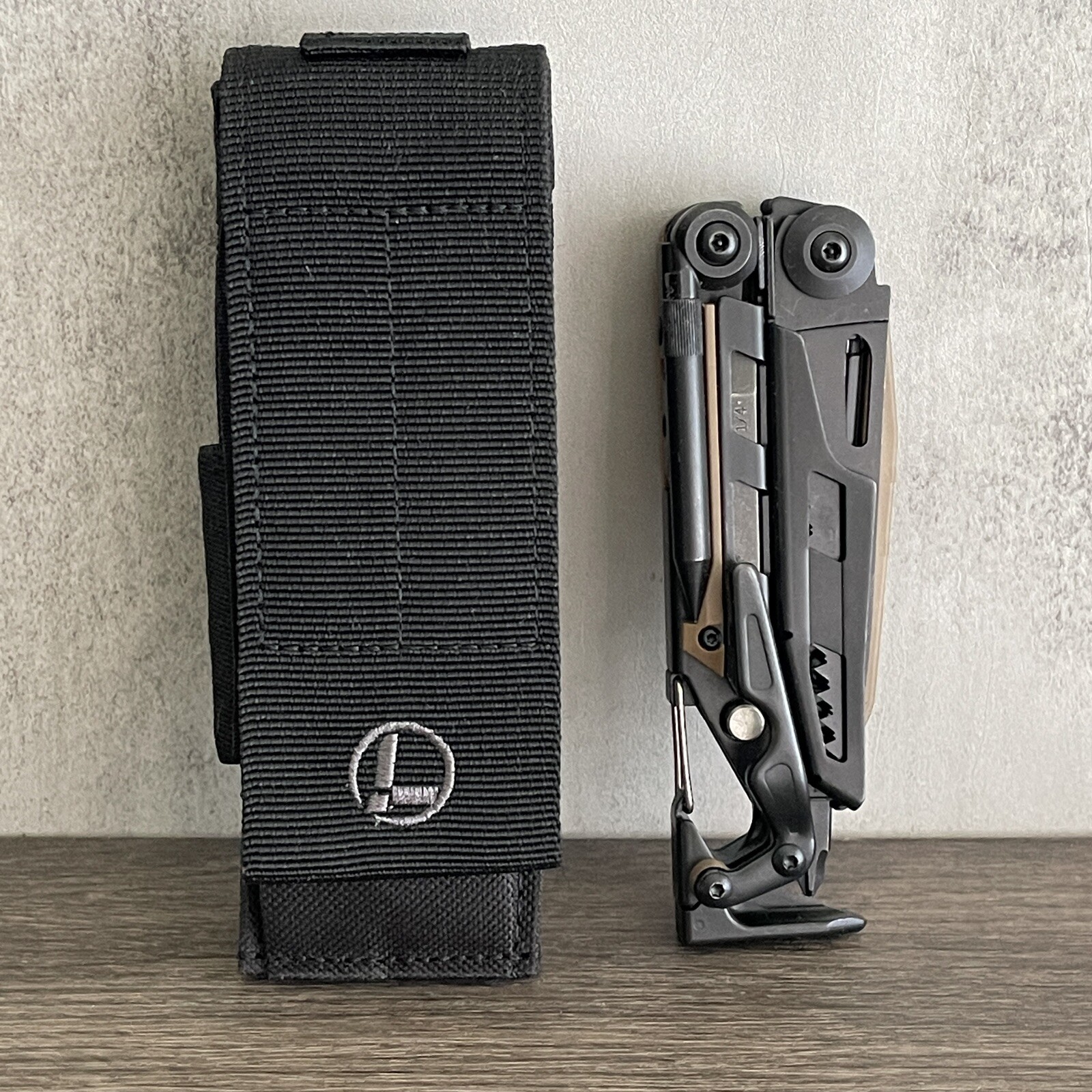 Leatherman MUT EOD Black multi tool with Brown/Tan Inserts. Discontinued Variant